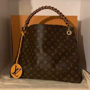 Louis Vuitton Artsy MM with braided strap.